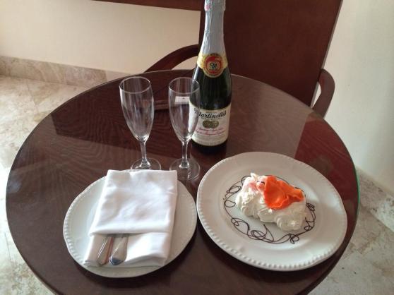 A special babymoon gift from our concierge. Sparkling cider and a freaky baby cake!
