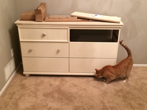 In the end, the incomplete dresser looks like this. I bought a bunch of different knobs and didn't like the look, so now I will be ordering some more. This piece remains a work in progress.
