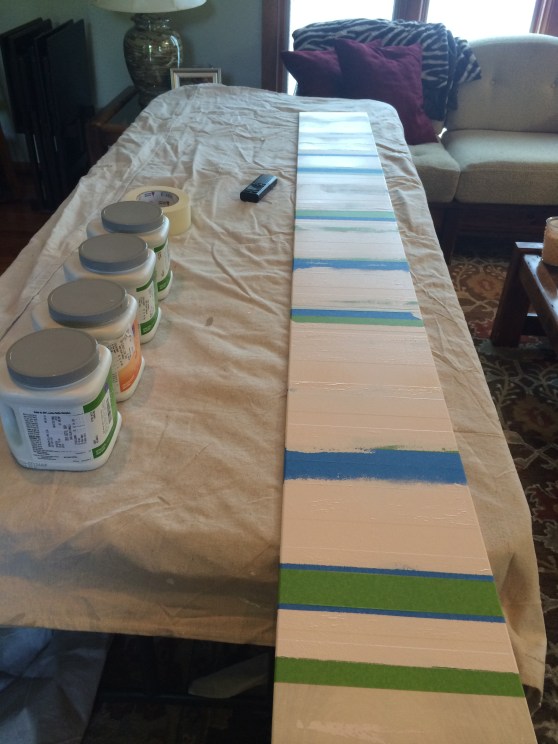 My make shift craft table set up in the living room. This allowed me to not only paint, but also watch "terrible tv" as my husband calls it.