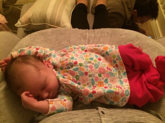 Tiny babes sleeping on the boppy after a good snack.